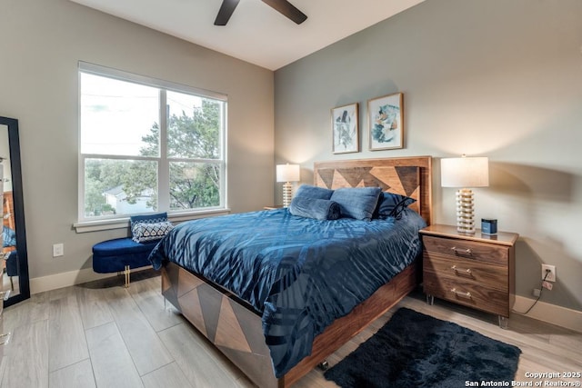 7812 Ventura Blvd, Selma, TX 78154 - bedroom featuring baseboards, light wood-style flooring, and a ceiling fan