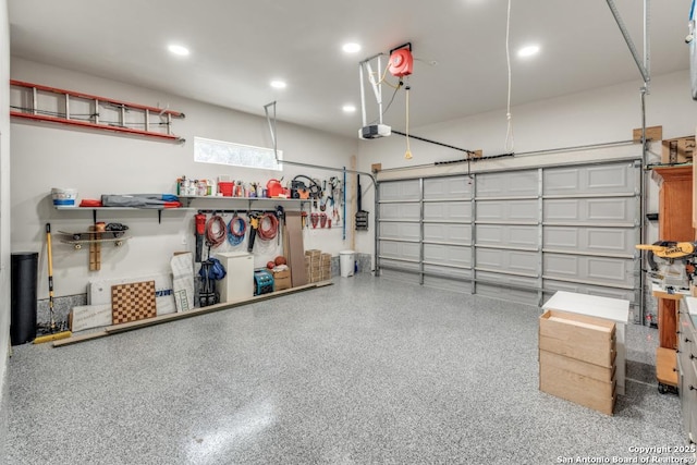 7812 Ventura Blvd, Selma, TX 78154 - garage featuring a garage door opener and recessed lighting