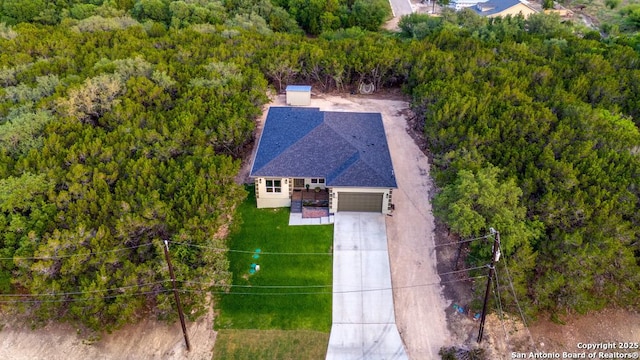 7812 Ventura Blvd, Selma, TX 78154 - aerial view of property and surrounding area featuring a forest