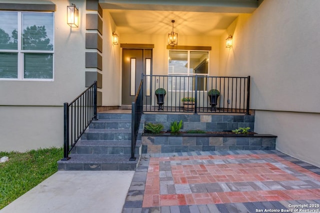 7812 Ventura Blvd, Selma, TX 78154 - view of exterior entry with stucco siding and a porch