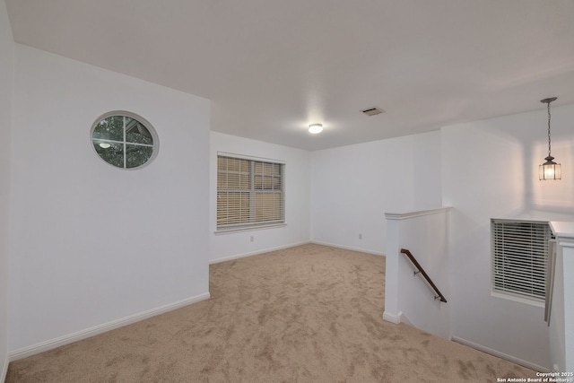 7603 Braun Bnd, San Antonio, TX 78250 - empty room with light colored carpet and baseboards