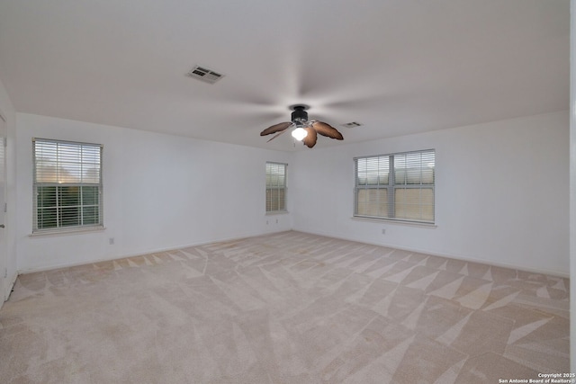 7603 Braun Bnd, San Antonio, TX 78250 - unfurnished room featuring a ceiling fan, light carpet, and baseboards