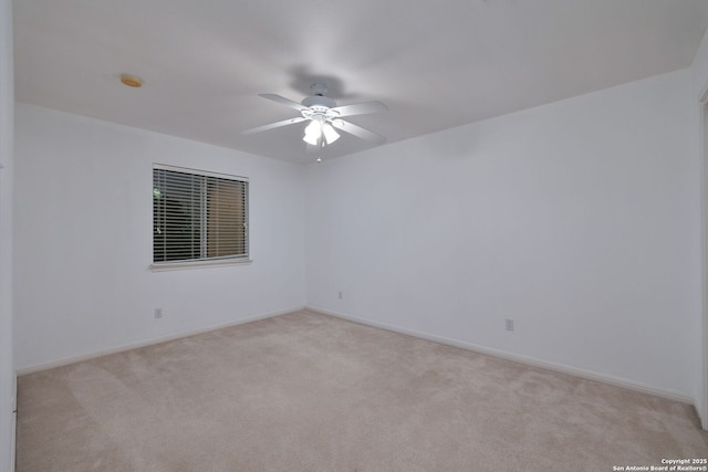 7603 Braun Bnd, San Antonio, TX 78250 - spare room with ceiling fan, light carpet, and baseboards