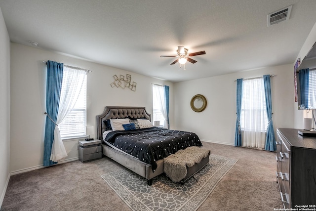 15323 Danae Bnd, San Antonio, TX 78245 - bedroom featuring carpet flooring, ceiling fan, and baseboards