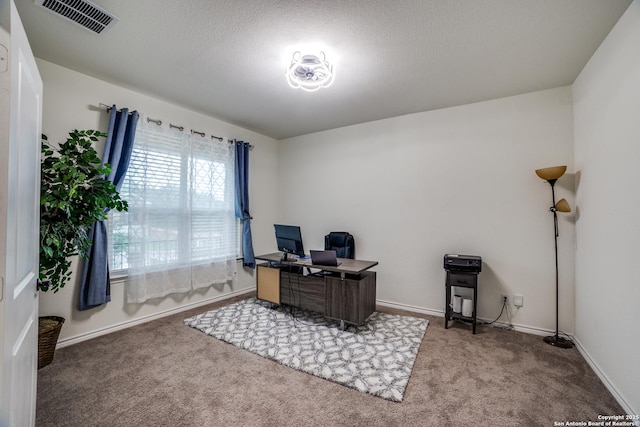15323 Danae Bnd, San Antonio, TX 78245 - carpeted home office with baseboards and a textured ceiling