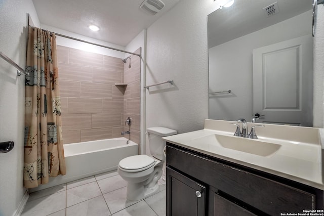 15323 Danae Bnd, San Antonio, TX 78245 - bathroom featuring tile patterned floors, toilet, shower / bathtub combination with curtain, and vanity