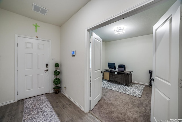 15323 Danae Bnd, San Antonio, TX 78245 - foyer entrance featuring wood finished floors and baseboards