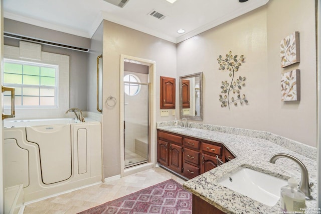 full bathroom featuring double vanity, a shower stall, a garden tub, and ornamental molding