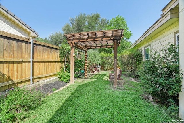 view of yard with a pergola