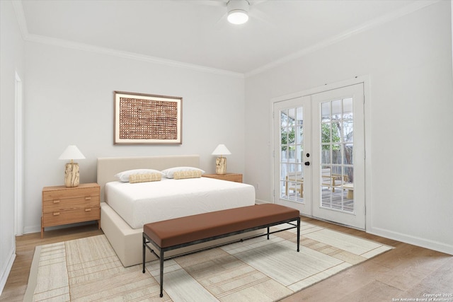bedroom with french doors, crown molding, access to exterior, wood finished floors, and baseboards