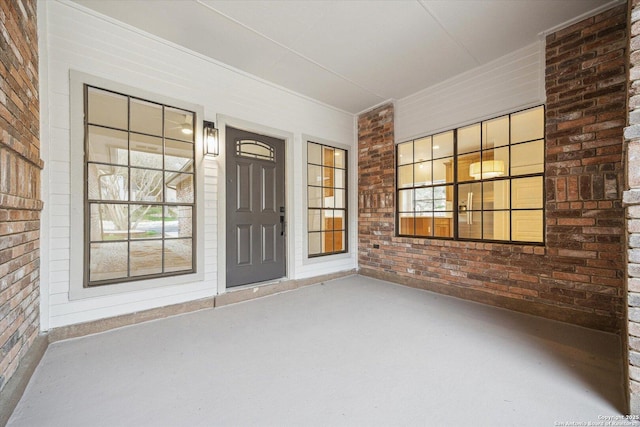 property entrance featuring covered porch