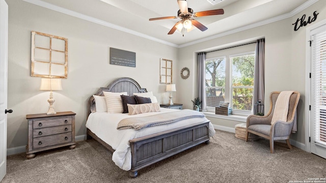 bedroom featuring carpet floors, ornamental molding, baseboards, and ceiling fan