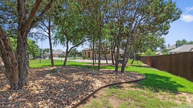 view of yard featuring a residential view