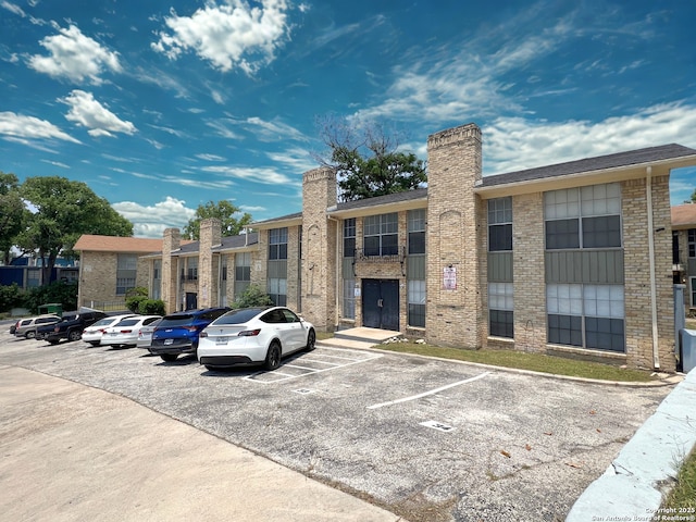 6611 Southpoint Unit 128, San Antonio, TX 78229 - view of property with uncovered parking
