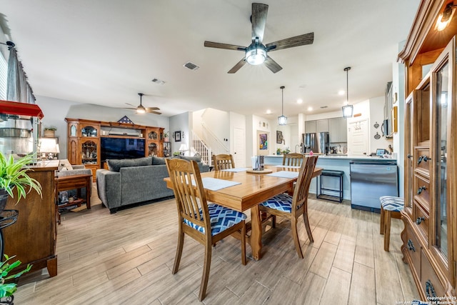 5249 Nature Path, Marion, TX 78124 - dining area featuring ceiling fan, stairs, light wood-type flooring, and recessed lighting