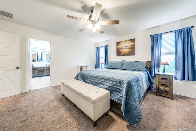 5249 Nature Path, Marion, TX 78124 - bedroom featuring light colored carpet, multiple windows, a ceiling fan, and baseboards