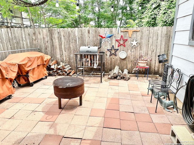 401/403 W Adams, Pleasanton, TX 78064 - view of patio with a fenced backyard and grilling area