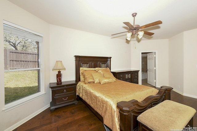 bedroom with dark wood-style floors, baseboards, and a ceiling fan