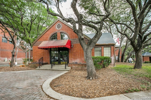 7930 Roanoke Unit 106, San Antonio, TX 78240 - view of exterior entry with brick siding