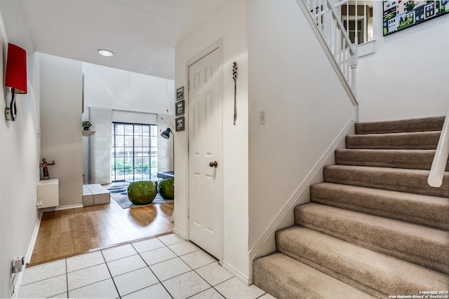7930 Roanoke Unit 106, San Antonio, TX 78240 - stairway with tile patterned floors, baseboards, and recessed lighting