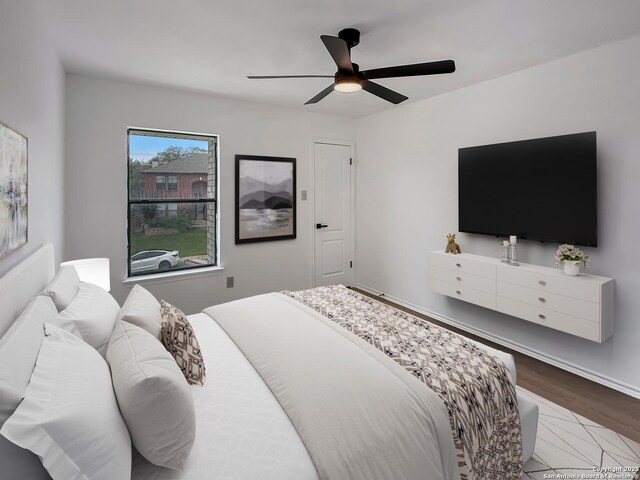 15827 Marisa, San Antonio, TX 78247 - bedroom featuring wood finished floors, a ceiling fan, and baseboards
