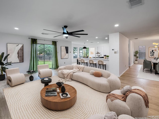15827 Marisa, San Antonio, TX 78247 - living room featuring light wood finished floors, a ceiling fan, recessed lighting, and baseboards