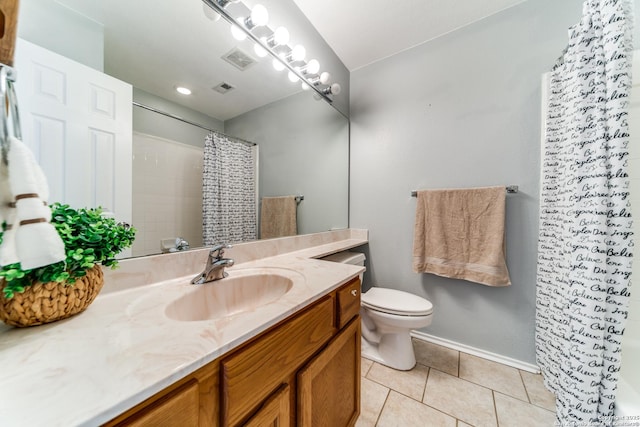 bathroom with tile patterned floors, baseboards, toilet, vanity, and a shower with shower curtain