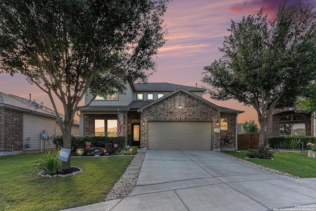 12338 Belfort Pt, Schertz, TX 78154 - view of front facade featuring a garage, driveway, and brick siding