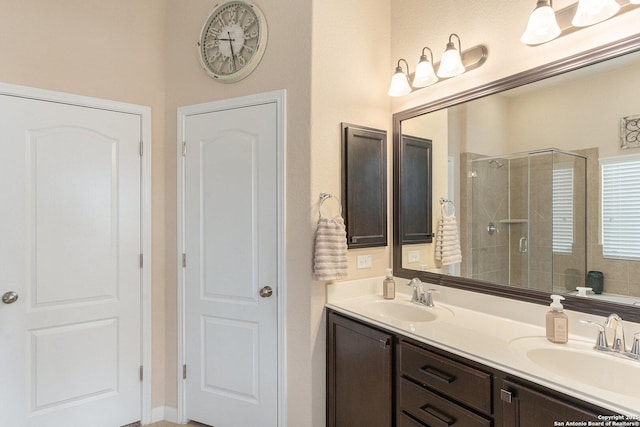 12338 Belfort Pt, Schertz, TX 78154 - bathroom with a shower stall and double vanity