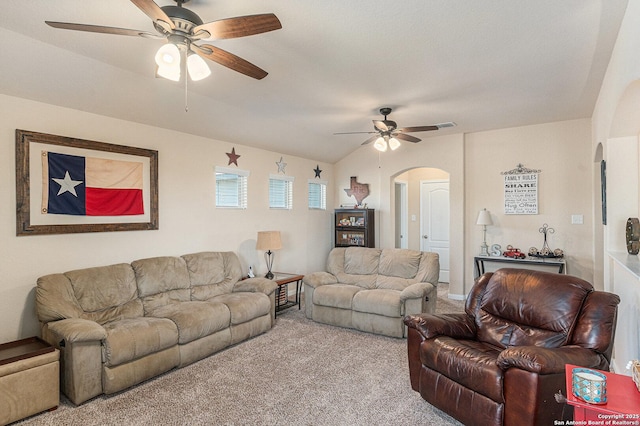 12338 Belfort Pt, Schertz, TX 78154 - carpeted living area with ceiling fan, arched walkways, and lofted ceiling