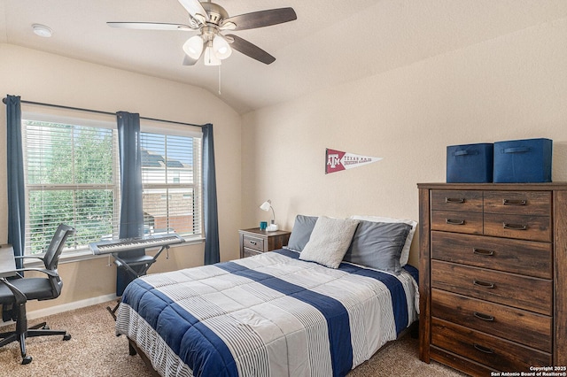 12338 Belfort Pt, Schertz, TX 78154 - bedroom featuring carpet flooring, vaulted ceiling, an office area, baseboards, and a ceiling fan