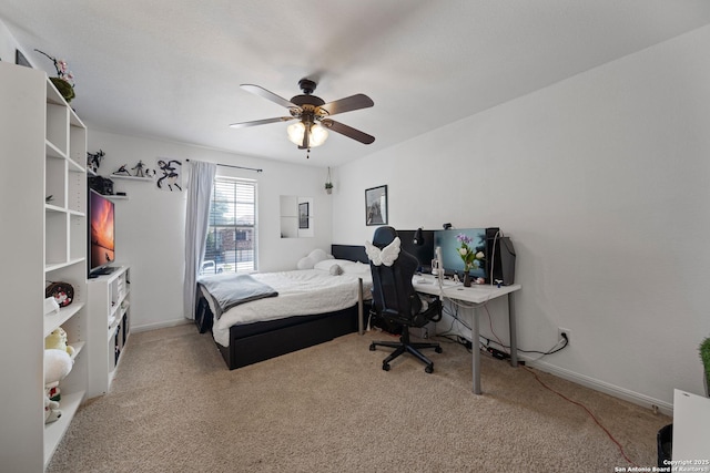 bedroom featuring carpet, a ceiling fan, and baseboards