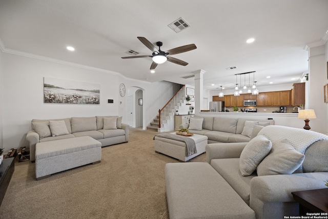 living room with recessed lighting, stairway, a ceiling fan, light colored carpet, and crown molding