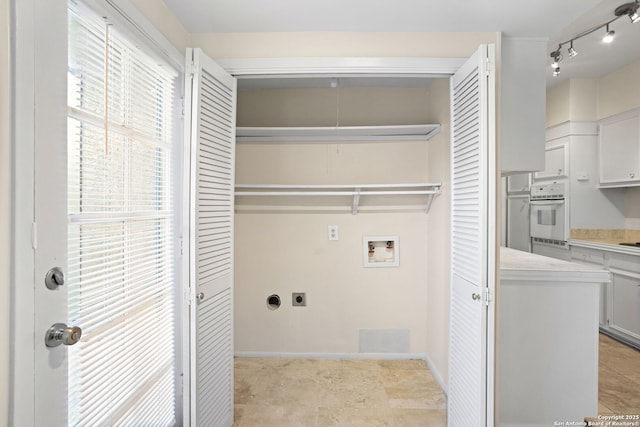 3678 Hidden Unit 504, San Antonio, TX 78217 - washroom with hookup for an electric dryer and washer hookup