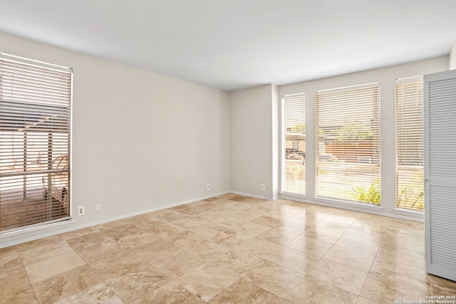 3678 Hidden Unit 504, San Antonio, TX 78217 - empty room featuring light tile patterned flooring and baseboards