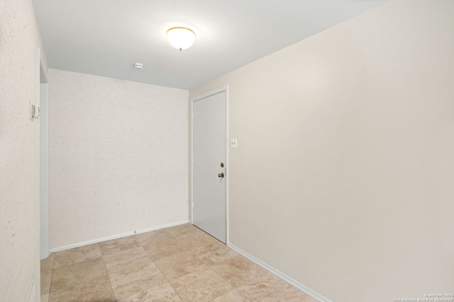 3678 Hidden Unit 504, San Antonio, TX 78217 - spare room featuring a smoke detector and baseboards