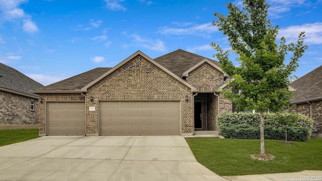12243 Dusty Boots, San Antonio, TX 78254 - view of front of property with an attached garage, brick siding, driveway, and a front yard