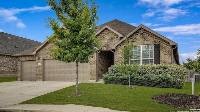12243 Dusty Boots, San Antonio, TX 78254 - view of front of home featuring a garage, concrete driveway, a front lawn, and brick siding