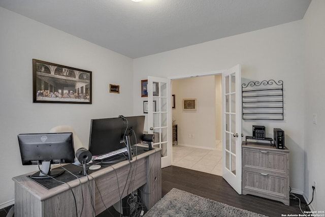 12243 Dusty Boots, San Antonio, TX 78254 - home office featuring french doors and dark wood-style floors