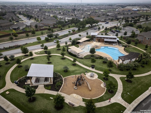 12243 Dusty Boots, San Antonio, TX 78254 - aerial view of property and surrounding area featuring a pool and nearby suburban area