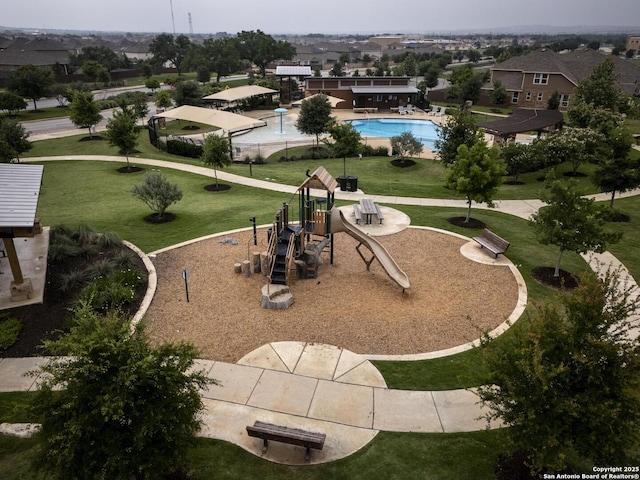 12243 Dusty Boots, San Antonio, TX 78254 - surrounding community featuring a lawn