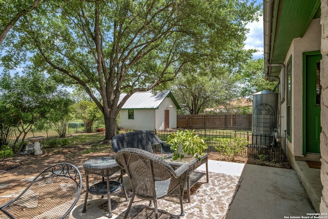 107 River Knl, Castroville, TX 78009 - view of patio featuring a shed and an outdoor structure