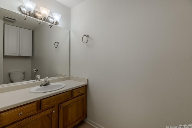 107 Mesa Del Sol, Kerrville, TX 78028 - half bath featuring vanity and toilet