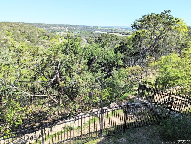 107 Mesa Del Sol, Kerrville, TX 78028 - view of mountain background with a forest