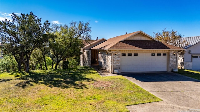 107 Mesa Del Sol, Kerrville, TX 78028 - single story home with a front yard, stone siding, and driveway