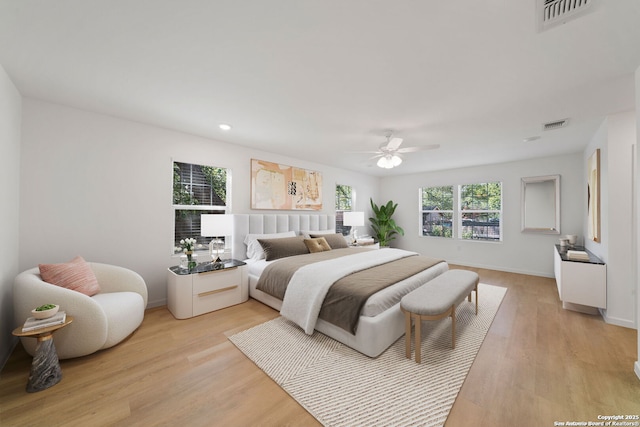 1212 Morales, San Antonio, TX 78207 - bedroom featuring light wood-style floors, a ceiling fan, recessed lighting, and baseboards