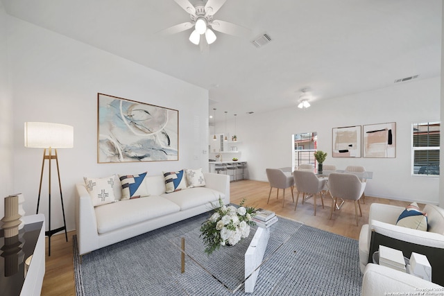 1212 Morales, San Antonio, TX 78207 - living area featuring wood finished floors and ceiling fan