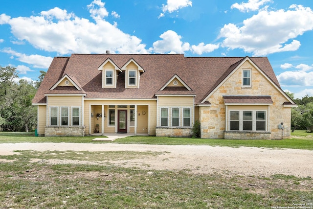201 Oak Rdg, Boerne, TX 78006 - view of front of property with stone siding, a shingled roof, and a front yard