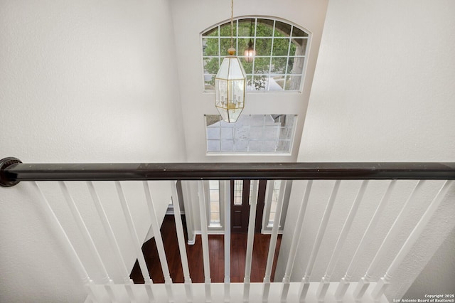18127 Brookwood Frst, San Antonio, TX 78258 - stairs with a chandelier
