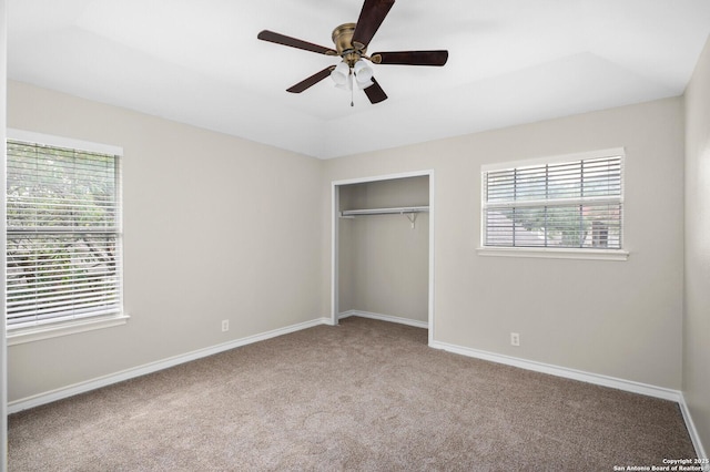 18127 Brookwood Frst, San Antonio, TX 78258 - unfurnished bedroom featuring carpet, a closet, baseboards, and ceiling fan